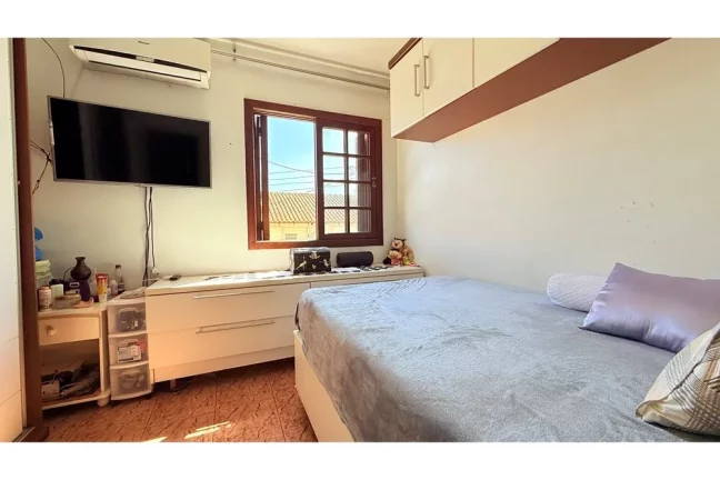 Imagem VNMC 100 Casa 610191037-77 - Casa à venda no bairro Vila Nova - Porto Alegre/RS