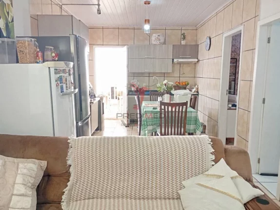 Imagem Casa no Bairro Santa Regina: Terreno Inteiro e Muito Espaço