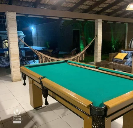 Imagem Casa 480m² com espaço gourmet e piscina, 7 quartos, 5 vagas de garagem à venda por R$ 2.500.000 - Piçarras - Guaratuba/PR
