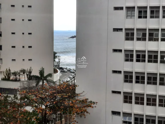 Imagem Excelente oportunidade: Apartamento atualizado com vista no Guarujá-SP, bairro Pitangueiras, 1 quarto, 2 salas, 1 banheiro, 2 vagas de garagem, 65m².