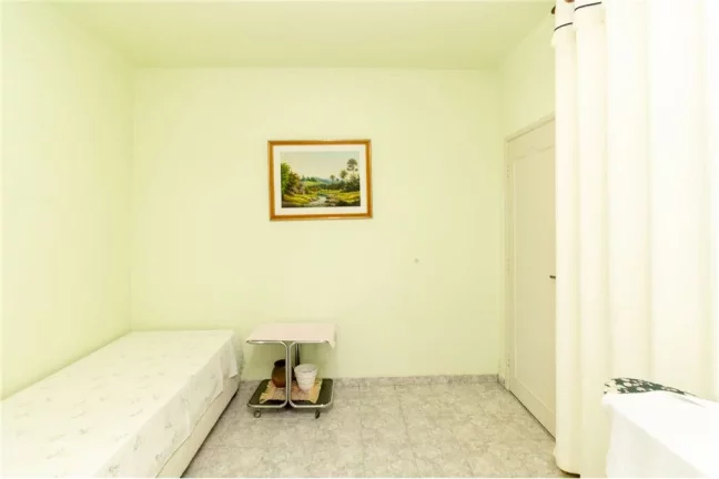 Imagem Sobrado com 5 casas e 1 galpão - Oportunidade de investimento ou moradia