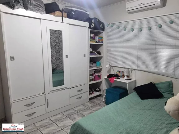 Imagem Casa Térrea à Venda no Centro de Campo Grande/MS contendo 1 Suíte + 2 Dormitórios + Sala Ampla e 3 Vagas em 204,16 m2 de Área Útil + 500 m2 de Terreno