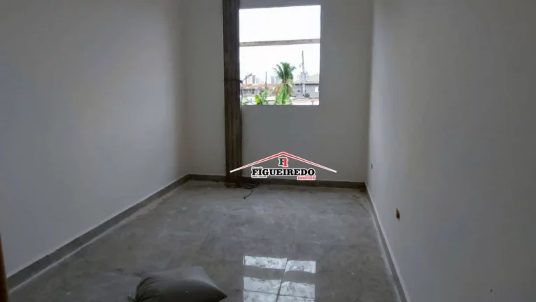 Imagem Casa com 2 dormitórios à venda, 60 m² por R$ 350.000 - Tude Bastos - Praia Grande/SP