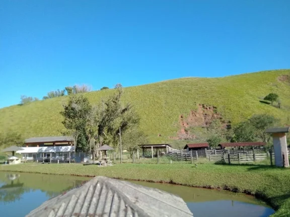 Imagem VENDO FAZENDA EM CASiMIRO DE ABREU, COM NASCENTE,CACHOEIRA,LAGO PARA PEIXE