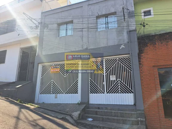 CASA COM GARAGEM - CENTRO