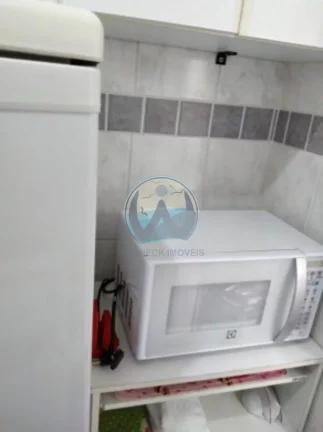 Imagem Apto à venda em Ubatuba-SP, Praia Grande: 1 quarto, 2 salas, 1 banheiro, 1 vaga, 40m² de área.