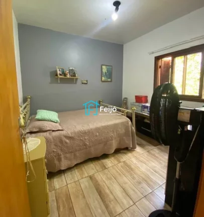 Imagem Casa 4 dormitórios com 2 pisos na Restinga Nova