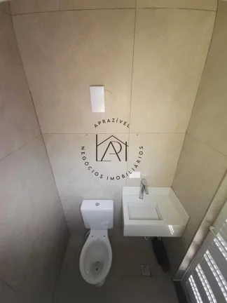 Imagem Casa para Venda em Praia Grande, Mirim, 2 dormitórios, 1 suíte, 3 banheiros, 3 vagas
