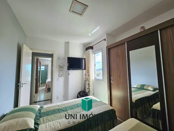Imagem Amplo apto 2 quartos/suíte, à Venda na Praia do Morro - Prédio com elevador e vista montanhas !