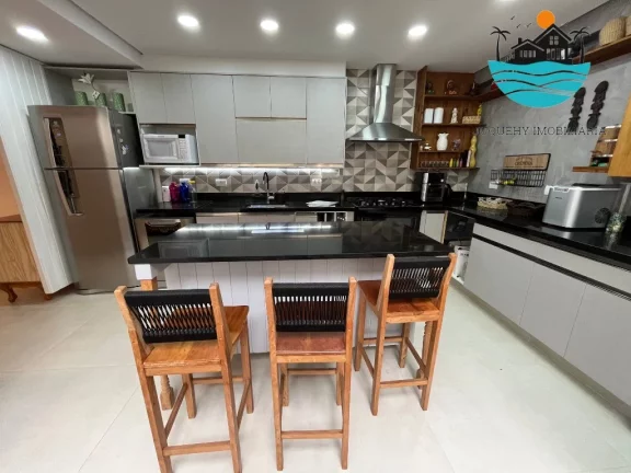 Imagem Casa em Juquehy para alugar - condomínio fechado com 5 suítes, 3 vagas, 100m da praia - Acomodação máx. 12 pessoas | Juquehy Imobiliária.