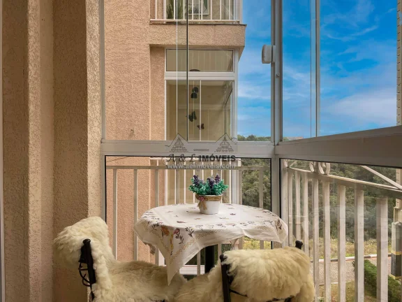 Imagem Apartamento 2 dorms. Reali Fiori — varanda, Airbnb | Campos do Jordão