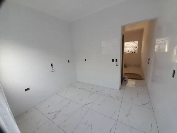 Imagem Casa com 2 dormitórios à venda, 65 m² por R$ 370.000,00 - Maracanã - Praia Grande/SP