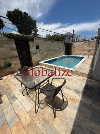 Imagem Sobrado com 3 dormitórios, piscina, 2 vagas de garagem no bairro do Embaré em Santos por R$ 1.270.000,00