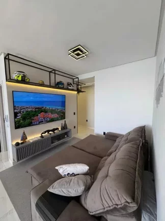 Imagem Apartamento vista mar com 2 suítes e 3 vagas de garagem em Balneário Perequê