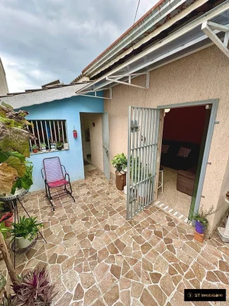 Imagem Casa Térrea com 3 Dormitórios e Suíte em Terra Preta - 450mil