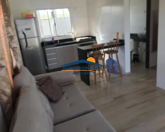 Imagem Casa com 2 dormitórios à venda, 70 m² por R$ 310.000 - Golfinho - Caraguatatuba/SP
