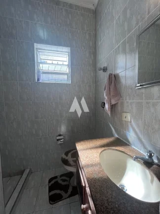 Imagem Casa geminada com churrasqueira em São Vicente!