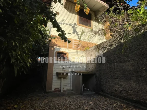 Imagem CASA ALTO PADRÃO COM 5 QUARTOS, DE FRENTE PARA O MAR, NA ESQUINA DA AVENIDA PRINCIPAL