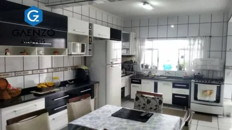 Imagem Sobrado a venda, 3 dormitórios (2 suítes), 4 vagas, Jd das Flores