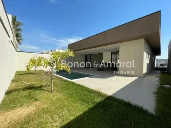 Imagem Lindo sobrado com 4 suítes, sendo uma master com jardim de inverno, outra no térreo, varanda. Espa...