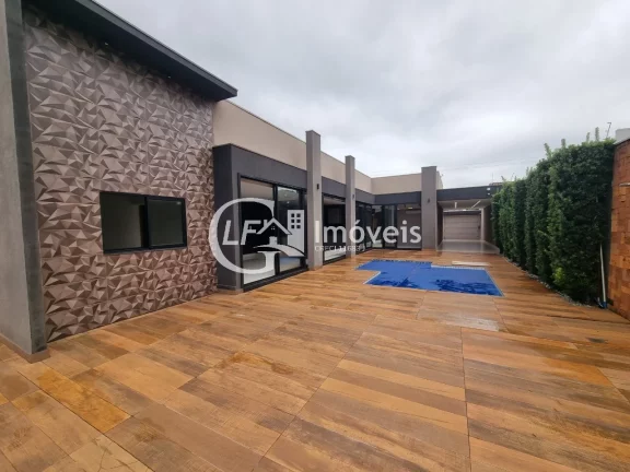 Imagem Impecável casa à venda em Campo Grande-MS, na Vila Jacy: 3 suítes, 2 salas, 4 banheiros, 5 vagas de garagem, 162,76 m² de área.