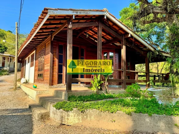 Imagem Magnífico Sítio de 3 Hectares com Cachoeira Privativa em Paraibuna-SP: 6 quartos, 1 suíte, 7 salas, 6 banheiros, 20 vagas de garagem.