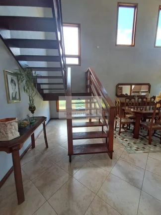 Imagem Imperdível: Casa à venda em Itatiaia-RJ, 5 quartos, 2 suítes, 1 sala, 5 banheiros, 4 vagas, 373,64m² de área. Confira já!