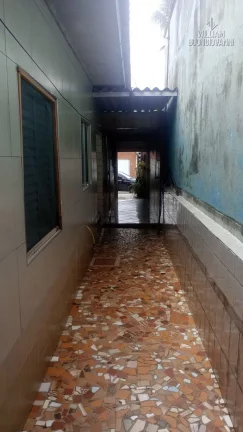 Imagem Casa em Praia Grande, na Vila Tupi, 2 dormitórios e área construída de 93,7 m².