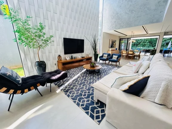 Imagem Casa de Luxo à Venda na Riviera de São Lourenço Módulo 17: 8 Quartos, 8 Suítes, 3 Salas, 4 Vagas de Garagem e 620m² de Área!