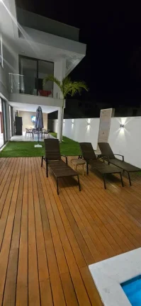 Imagem Imóvel à venda: Casa em Condomínio com Piscina no bairro GUARAJUBA, Camaçari - 422m²