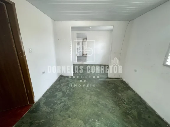 Imagem Oportunidade! Terreno + 3 Casas Prontas para Morar ou Alugar