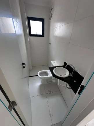 Imagem Imperdível oportunidade: Apartamento à venda em Praia Grande-SP, bairro Tupi, 2 quartos, 1 suíte, 2 salas, 1 vaga, 59m²!