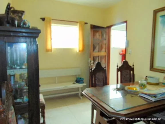 Imagem Tombo - Pertinho do mar - 78 m² úteis - Garagem - Condomínio baixo.