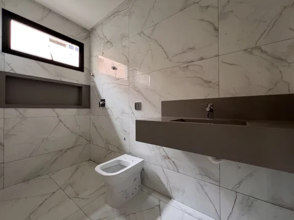 Imagem Casa Alto Padrão à Venda no Alto dos Caiçaras – 3 Suítes, Piscina e Área Gourmet em Patos de Minas