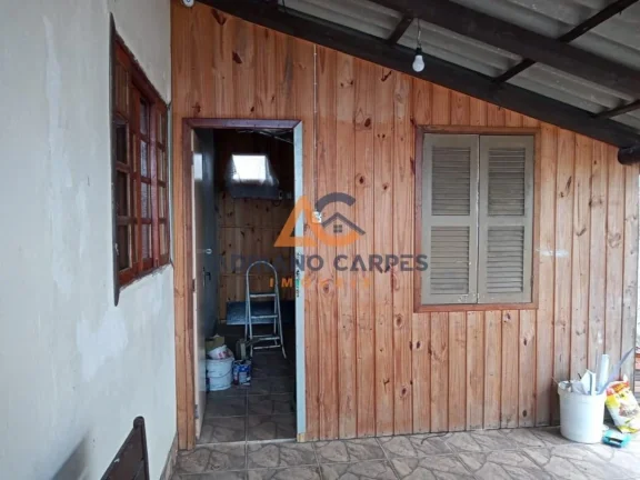 Imagem Casa com 2 dormitórios localizada no bairro Porto escalvados, em Navegantes - Adriano Carpes Imóveis Vende