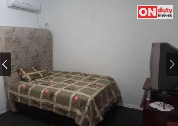Imagem Sobrado à venda, 114 m² por R$ 690.000,00 - Ponta da Praia - Santos/SP