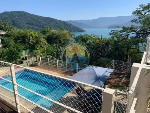 Imagem Magnífica Casa à Venda em Ubatuba-SP, Bairro Ponta Grossa - 4 Quartos, 3 Suítes, 2 Salas, 2 Banheiros, 5 Vagas de Garagem, 437m².