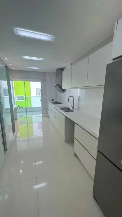 Imagem Apartamento frente mar mobiliado com 4 suítes e 3 vagas de garagem em Itapema