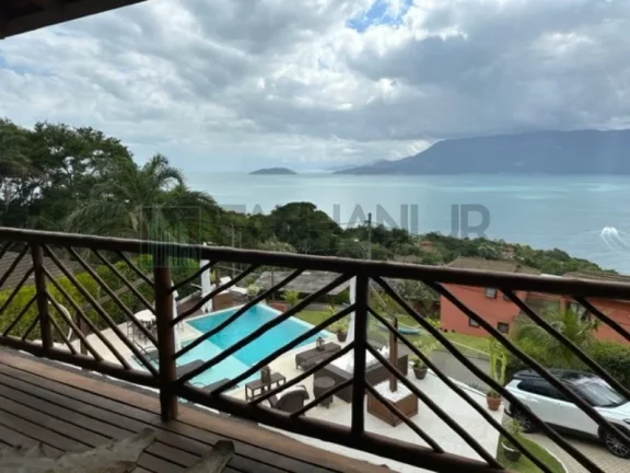 Imagem Deslumbre-se com esta incrível oportunidade de adquirir uma casa dos sonhos no exclusivo condomínio Yacamim, localizado em Ilhabela. Com uma vista esp