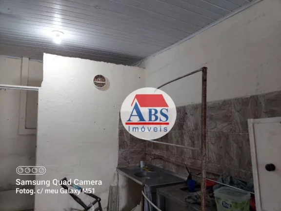 Imagem casa com duas lojas e uma edícula