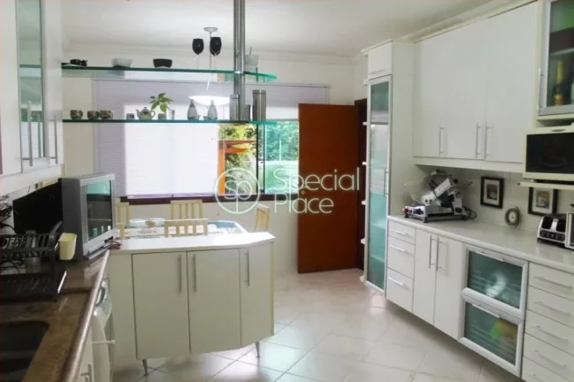 Imagem Casa de condomínio de alto padrão com 4 Suites com armários, escritório, Varanda, Living 2 ambie...