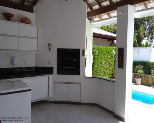 Imagem Casa de luxo em condomínio à venda em Busca Vida, Camaçari-BA: 4 quartos, 4 suítes, 2 salas, 2 banheiros, 4 vagas, 450m².