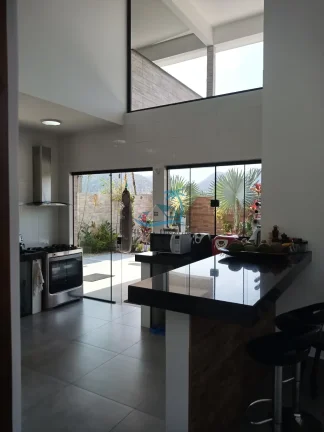 Imagem Casa de alto padrão a venda com 4 dormitórios, 360m² de área construída - Jardim Carolina em Ubatuba.