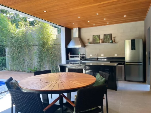 Imagem Casa de luxo à venda em Riviera de São Lourenço Módulo 24: 5 quartos, 5 suítes, 3 salas, 6 vagas de garagem, 400m².