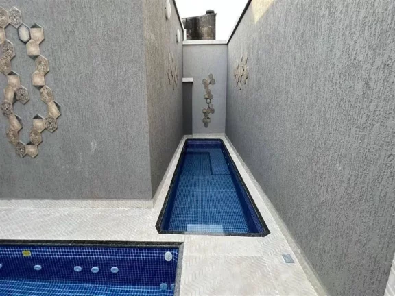 Imagem Sobrado com 2 dormitórios à venda, 48 m² por R$ 338.000,00 - Maracanã - Praia Grande/SP