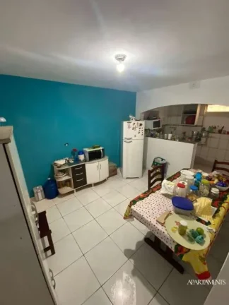 Imagem Terreno com 3 Casas com 3 vagas de carro e moto.