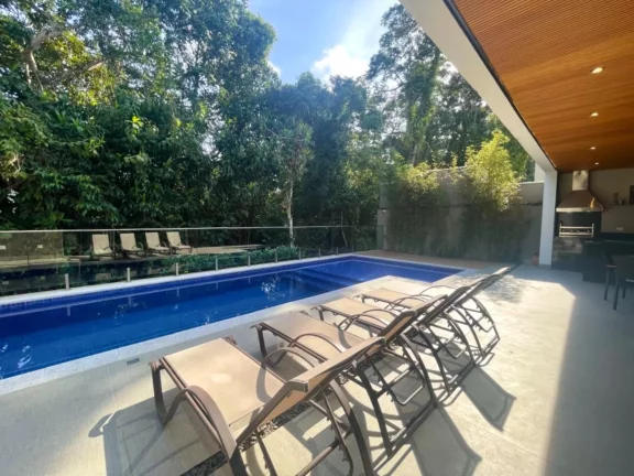 Imagem Casa de luxo à venda em Riviera de São Lourenço Módulo 24: 5 quartos, 5 suítes, 3 salas, 6 vagas de garagem, 400m².