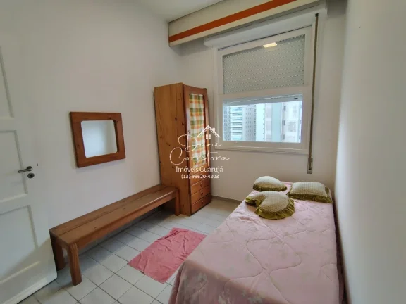 Imagem Imperdível! Apartamento de 3 quartos com suíte e 2 salas em Pitangueiras, Guarujá-SP. 100m² de conforto e elegância.
