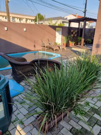 Imagem SOBRADO com 4 dormitórios à venda por R$ 790.000,00 no bairro Maria Antonieta - PINHAIS / PR