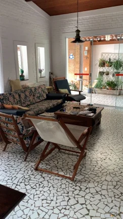 Imagem CASA NO BAIRRO DO ITAGUÁ COM 5 DORMITÓRIOS SENDO 2 SUÍTES,2 BANHEIROS SOCIAL,VARANDA COM CHURRASQUEIRA